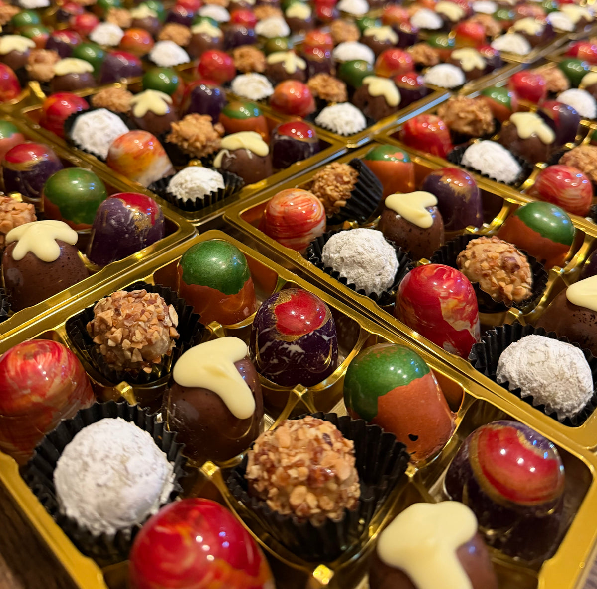 Gud Chocolate Christmas bonbons and truffles on trays